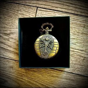 NWT functioning pocket watch. Nice weight, cool piece.